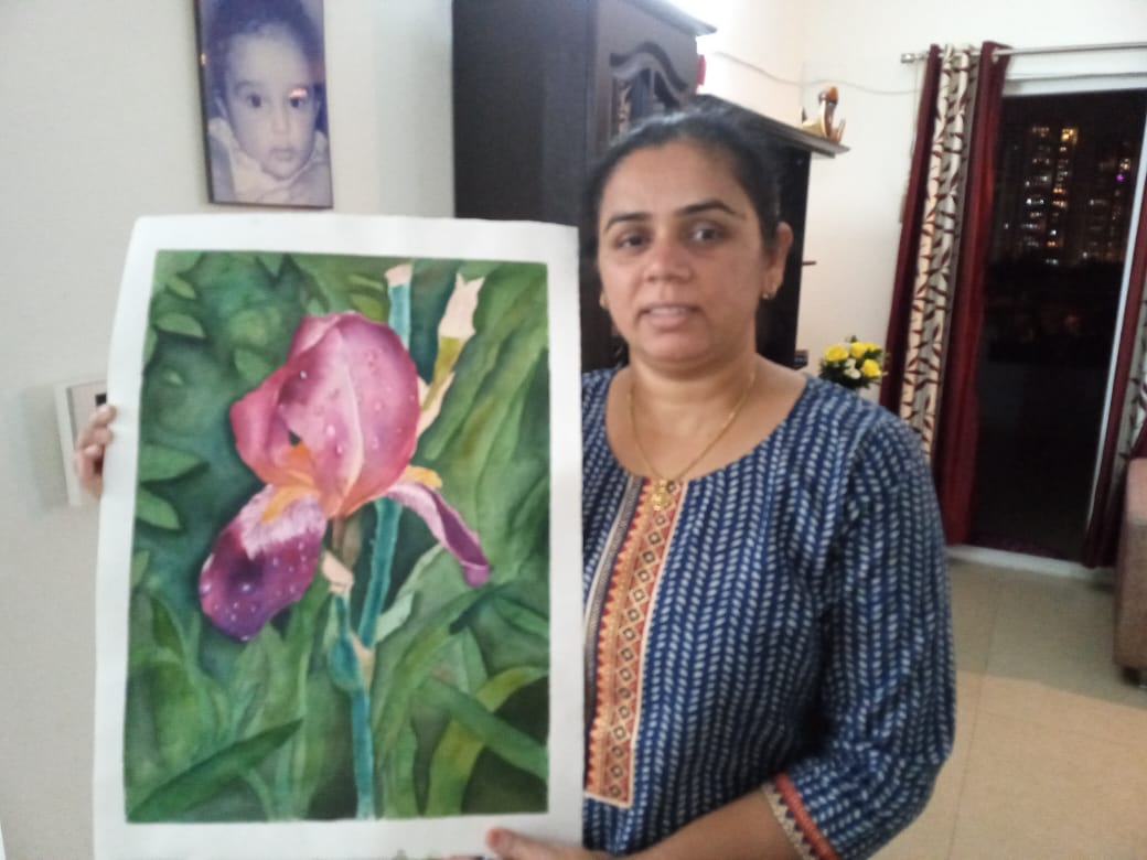 Bhanu workshop photo with flower painting